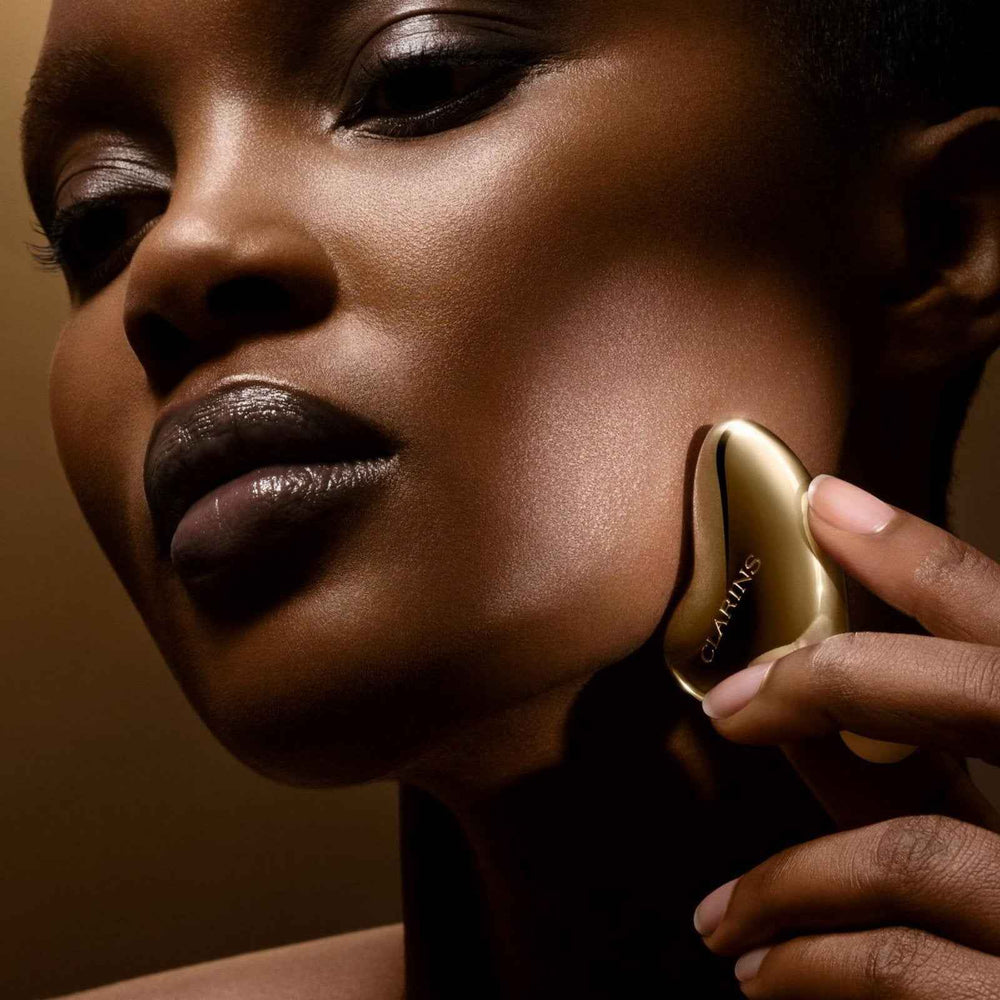 Clarins Precious Gold – Face Massage Stone for Women